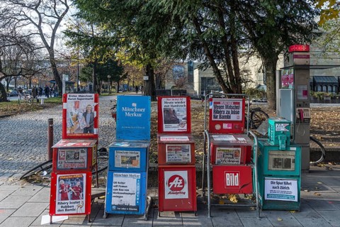 Various newspaper boxes on the street