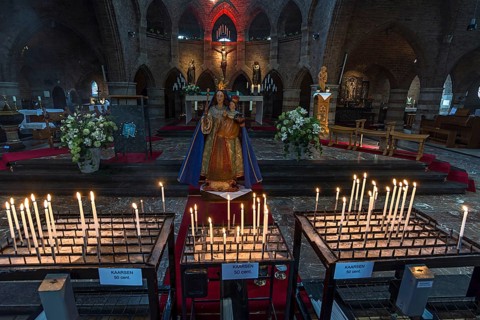 Altar of Mary with sacrificial candles