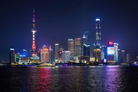 View from the Bund to the skyline at the Huangpu River with Oriental Pearl Tower
