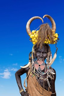 Woman with large lip plate and horns