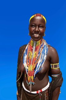 Woman with many pearl necklaces as necklace