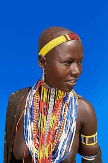 Woman with many pearl necklaces as necklace