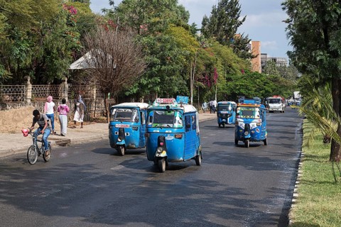 Tuk-Tuks driving on the road