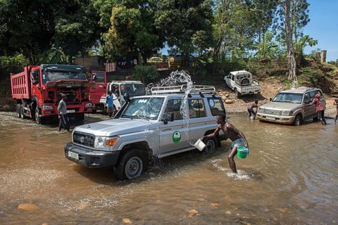 Cars are washed in the river