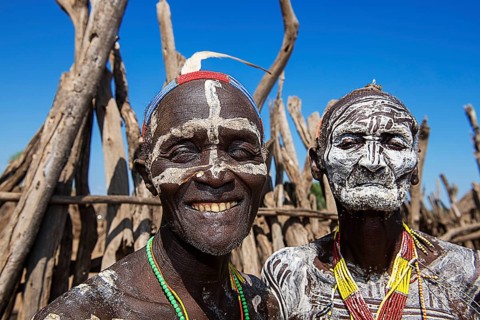 Old men of the tribe of the Karo with face painting