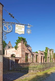Signboards with inscription Contemplation of Hammer at the inn