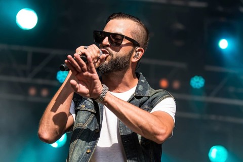 The swiss rapper and musician Marco Bliggensdorfer alias Bligg live at the 26th Heitere Open Air in Zofingen
