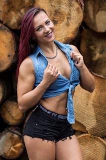 Young woman with jeans jacket and black hotpants