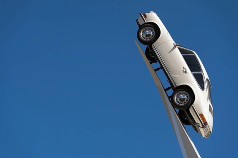 911 F-model from 1970 on a white pedestal