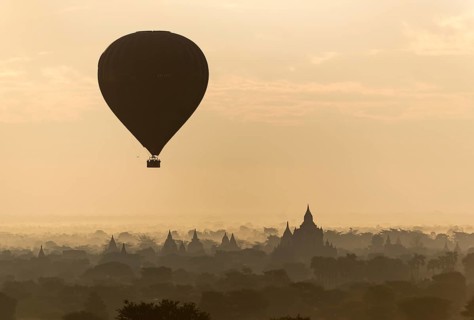 Hot-air Balloon in flight over temples of Bagan