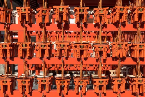Ema wish plaques in the shape of orange torii gate