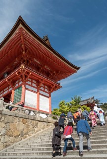 Visitors climb stairs
