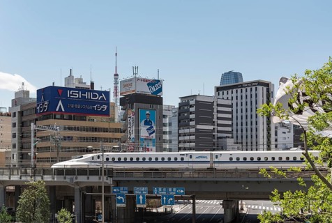 Shinkansen bullet train on a bridge in Shiodome
