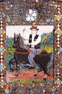 Tombstone showing a man on his horse