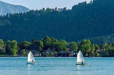 Regatta with children in sailing boats