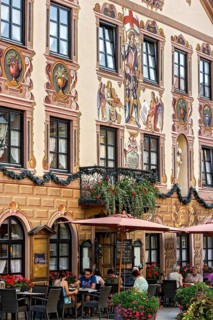 Gasthof zum Rassen with mural painting and iron balcony