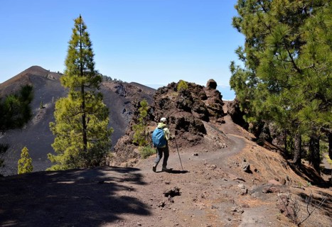 Female hiker in front of volcano Duraznero