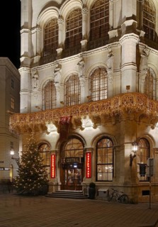 Christmas lighting on facade at night