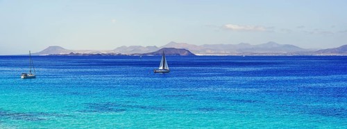 Sailboats in turquoise waters