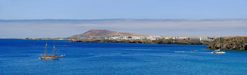 Beaches and Coast with sailing ship and Playa Blanca in the background