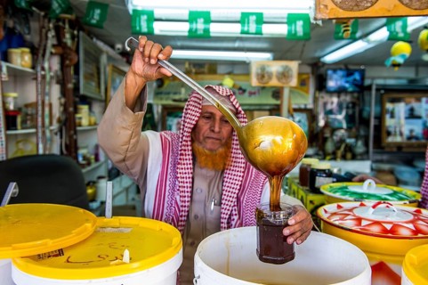 Man selling local honey