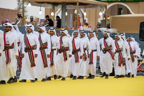 Traditional dressed local men dancing at the Al Janadriyah Festival