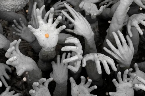 Hands pleading for help