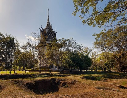 Mass graves in front of the Memorial Stupa