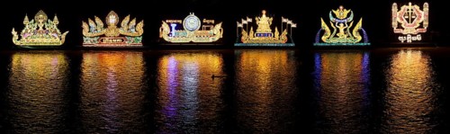 Shining boats during the royal procession at the Bon Om Touk Water Festival on the Tonle Sap River
