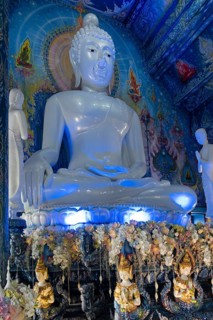 Blue illuminated Buddha in Wat Rong Seur Ten