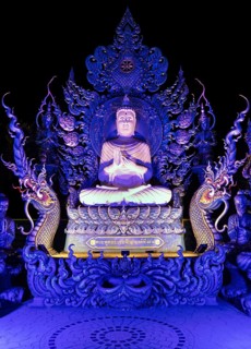 Blue Buddha Statue in the Garden of Wat Rong Seur Ten