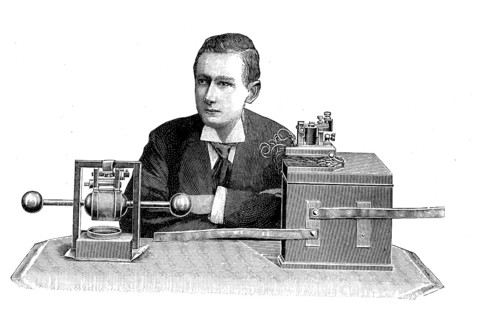 Guglielmo Marconi demonstrating apparatus he used in his first long distance radio transmissions in the 1890