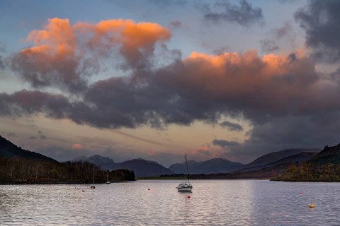 Sailboat with Loch Linnhe at sunrise with coloured clouds