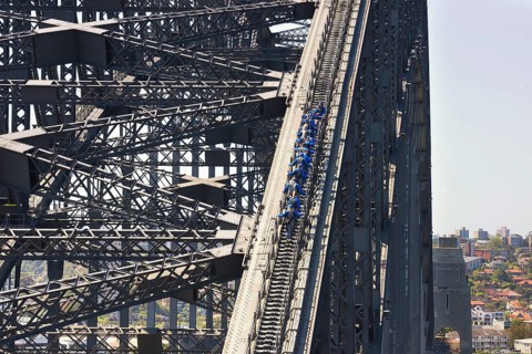 People walking on Sydney Harbor Bridge