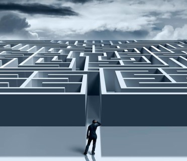 Man in front of labyrinth