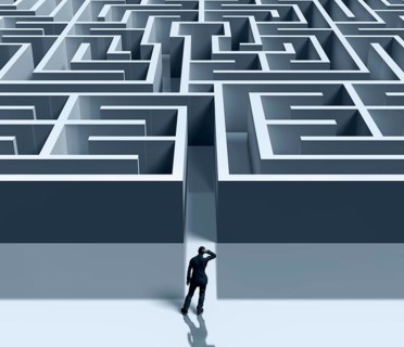 Man in front of labyrinth