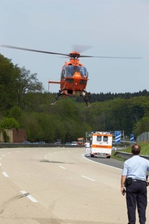 Rescue helicopter in action on the A3 motorway near Dierdorf