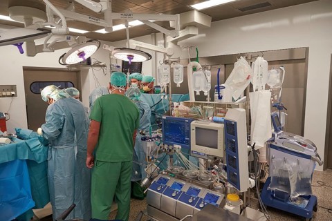 Heart surgeon Prof. Richard Frey during heart surgery in the operating room