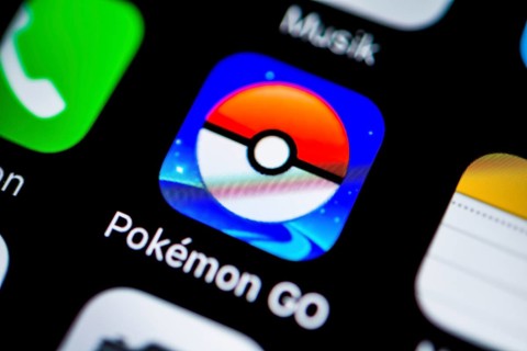 Smartphone screen with Pokemon Go app icon in detail
