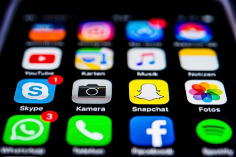 IPhone screen displaying multiple app icons