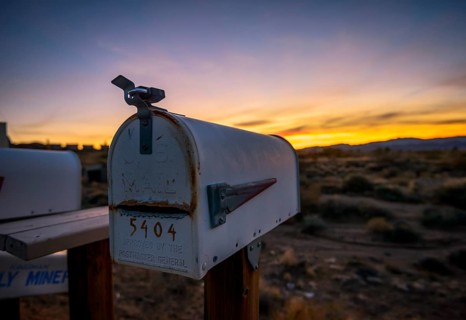 Roadside mailbox at sunset