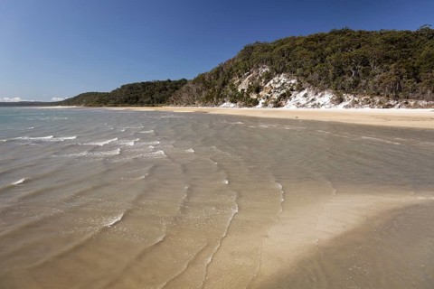 Bay with beach and cliffs