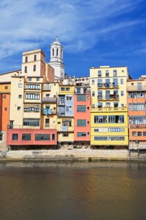 Colorful houses and Cathedral on the Onyar River