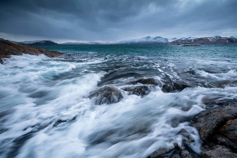Dark clouds over the stormy sea