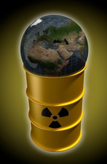 Globe lying on barrel with nuclear waste