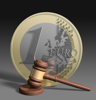 Gavel in front of euro coin