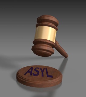 Gavel in front of grey background