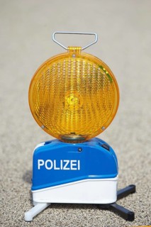 Warning lamp of the motorway police on the highway