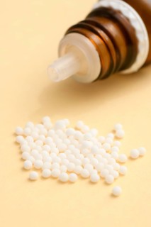 Globules in a pile with bottle