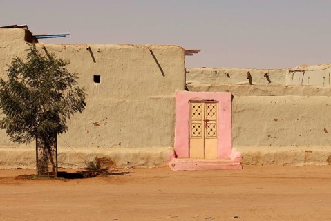 Pink door in village near Kerma